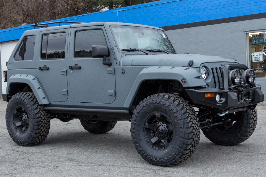 Line x custom jeep wrangler jk anvil wild boar fast back hard top side shot